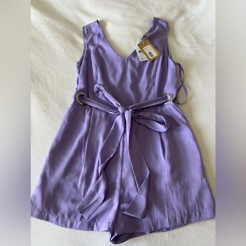Purple romper.